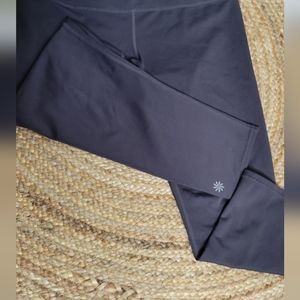 Athleta stride pocket Capri zip back pocket